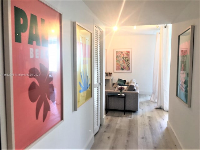 hallway featuring light hardwood / wood-style flooring