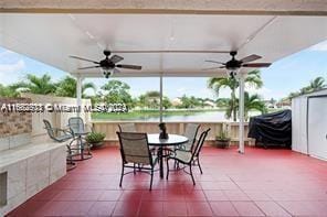 view of patio / terrace featuring ceiling fan