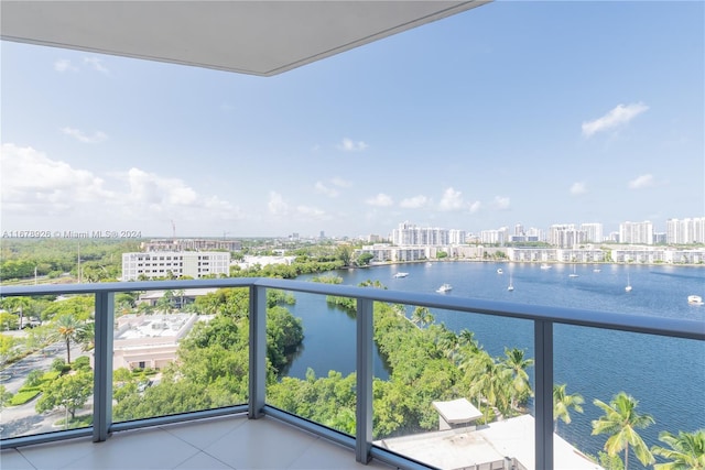 balcony featuring a water view