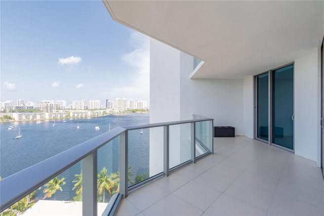 balcony featuring a water view