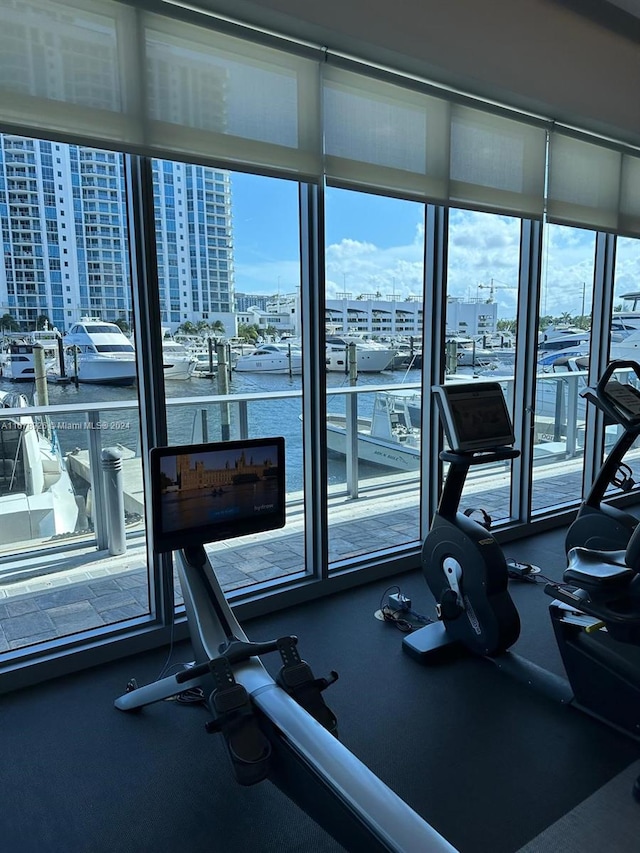 gym featuring a water view