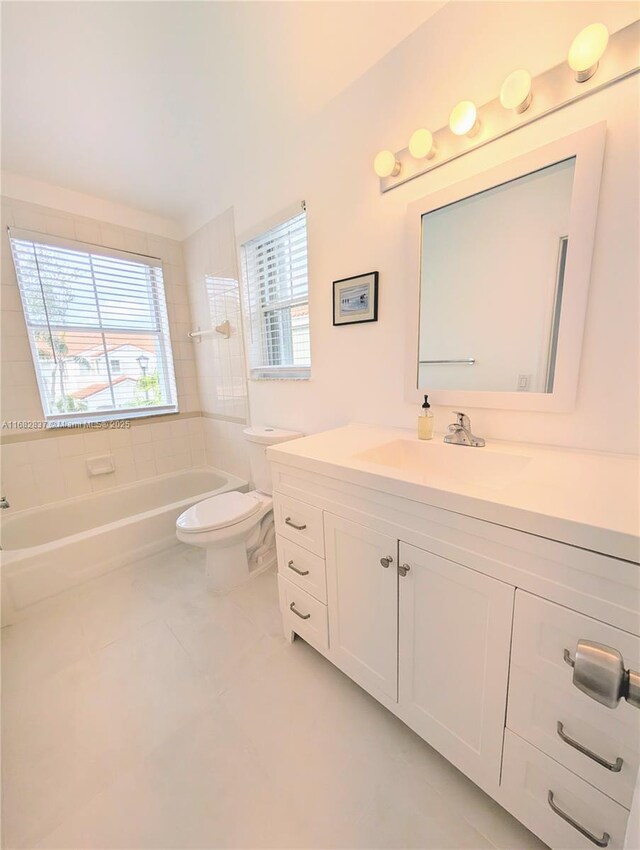 bathroom featuring tile patterned flooring, a shower with shower door, and toilet