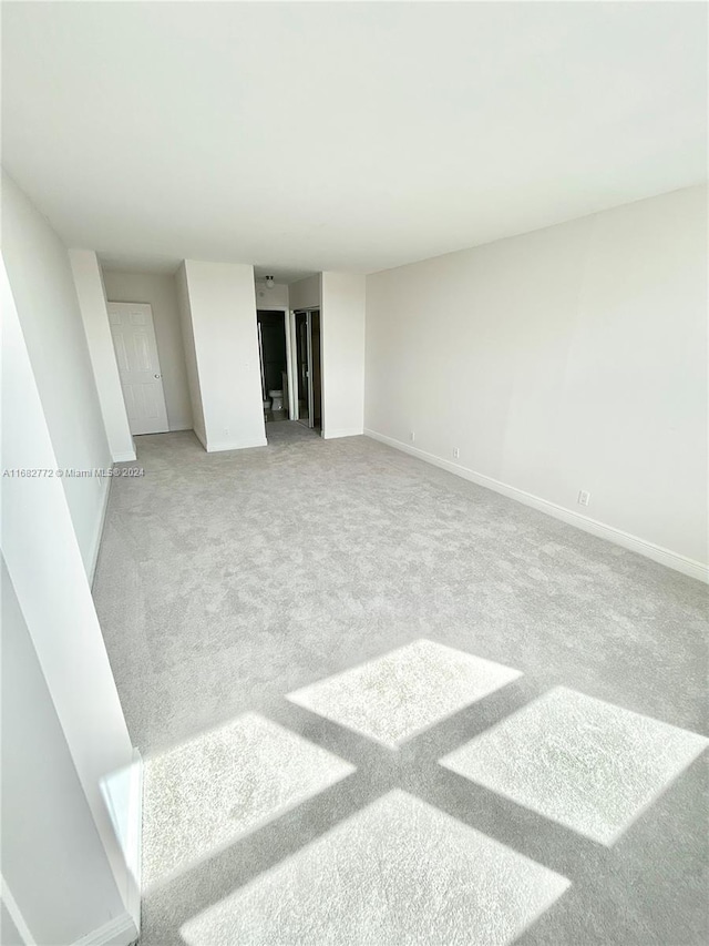 spare room with carpet flooring