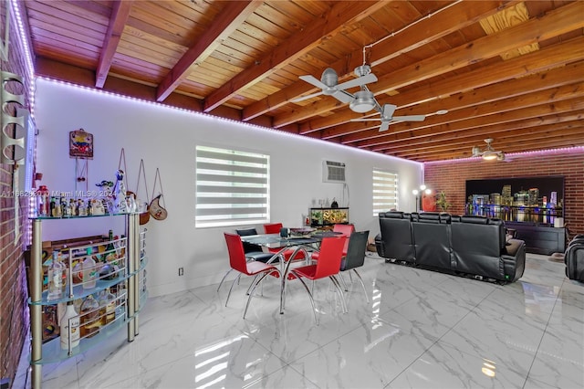 interior space with ceiling fan, brick wall, wood ceiling, and plenty of natural light