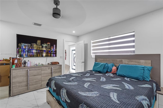 bedroom with bar and ceiling fan