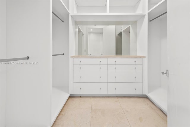 100 S Pointe Dr Unit 3402, Miami Beach, FL 33139 - spacious closet featuring light tile patterned flooring
