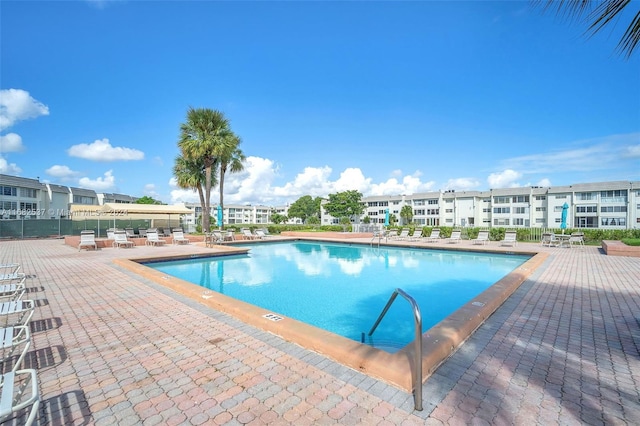 view of swimming pool with a patio