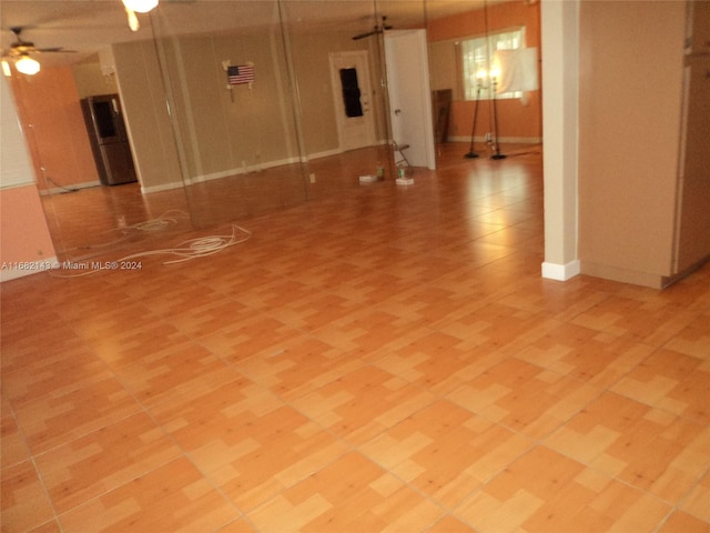 empty room featuring light hardwood / wood-style flooring and ceiling fan