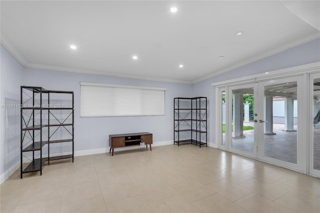 tiled empty room featuring french doors and crown molding