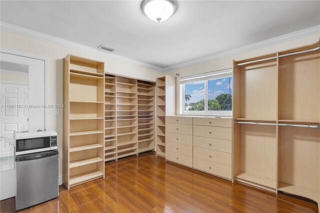 spacious closet featuring wood-type flooring