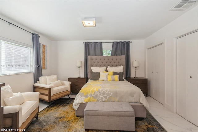 8135 SW 136th St, Pinecrest, FL 33156 - bedroom with two closets and marble look tiles