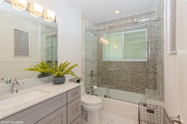 8135 SW 136th St, Pinecrest, FL 33156 - bathroom with vanity, enclosed tub / shower combo, and recessed lighting