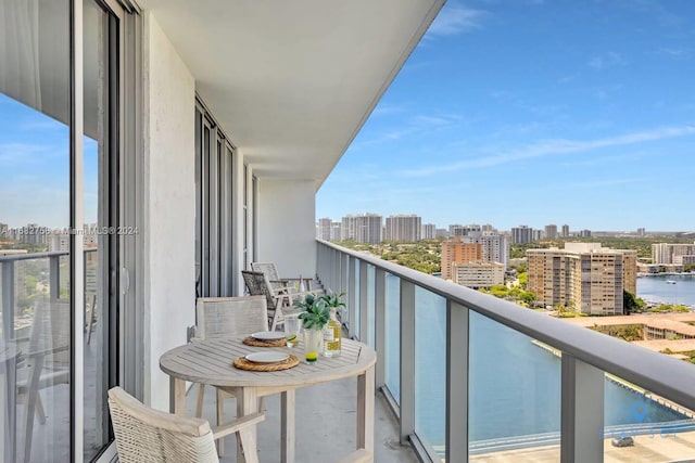 balcony featuring a water view