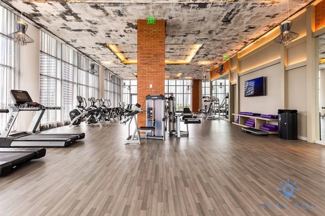 gym with hardwood / wood-style flooring