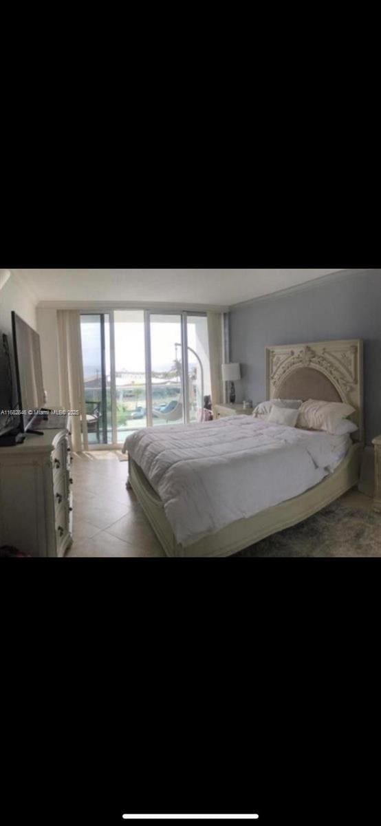 bedroom with light tile patterned flooring