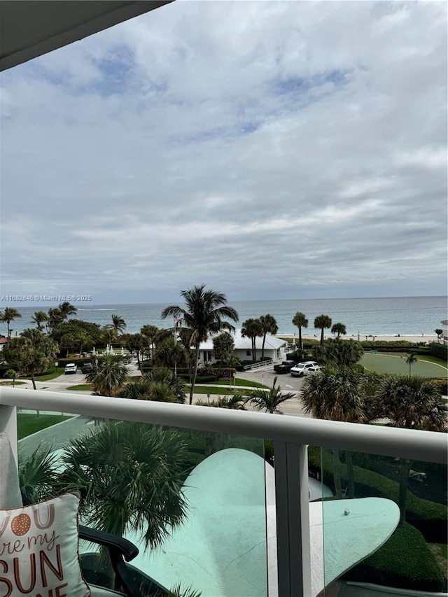 balcony featuring a water view