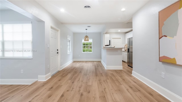 entryway featuring light hardwood / wood-style floors