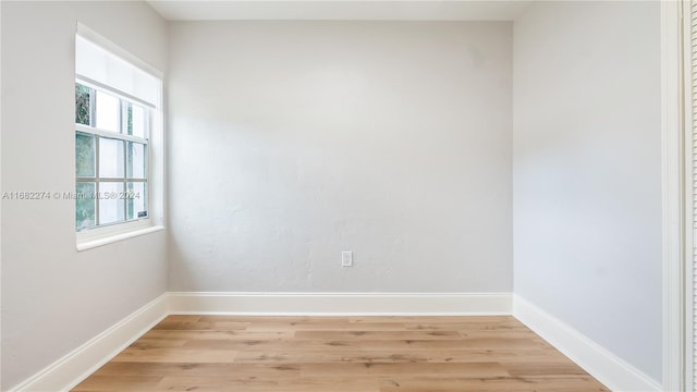 empty room with light wood-type flooring