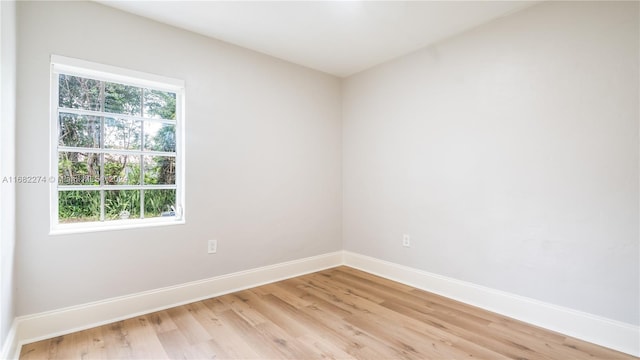 unfurnished room featuring light hardwood / wood-style flooring