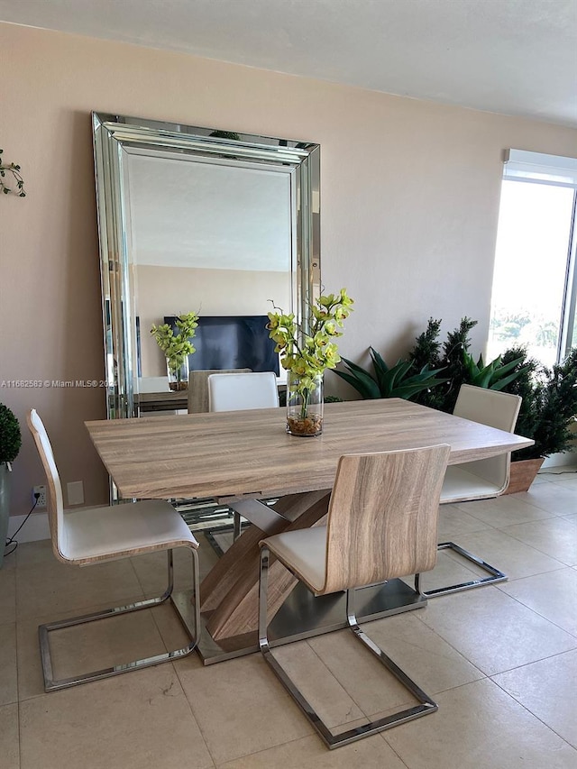 dining room with light tile patterned floors