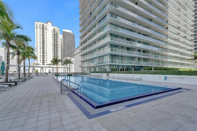 view of pool featuring a patio