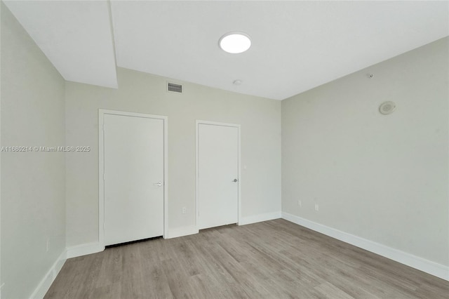 unfurnished bedroom featuring light hardwood / wood-style flooring