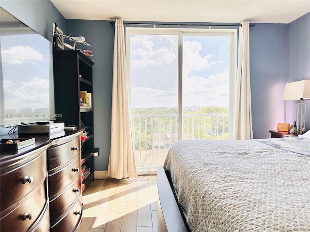 bedroom with wood-type flooring