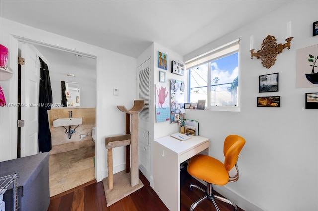 office featuring sink and dark hardwood / wood-style floors