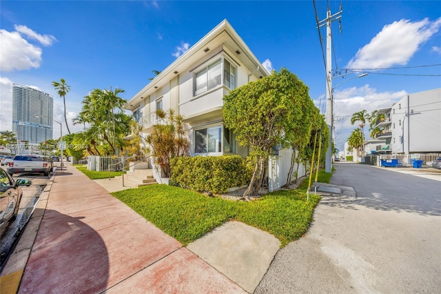 731 6th St Unit 201-E, Miami Beach, FL 33139 - view of property exterior with stucco siding