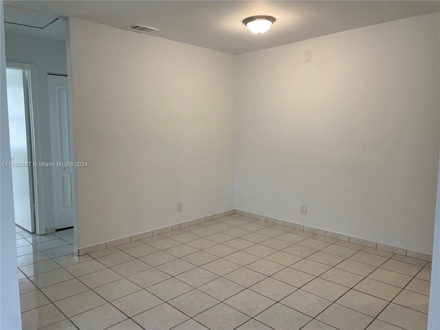 view of tiled spare room