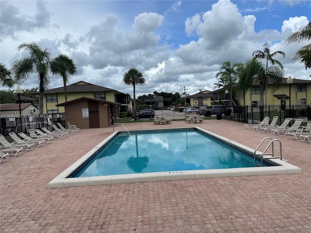 view of swimming pool featuring a patio