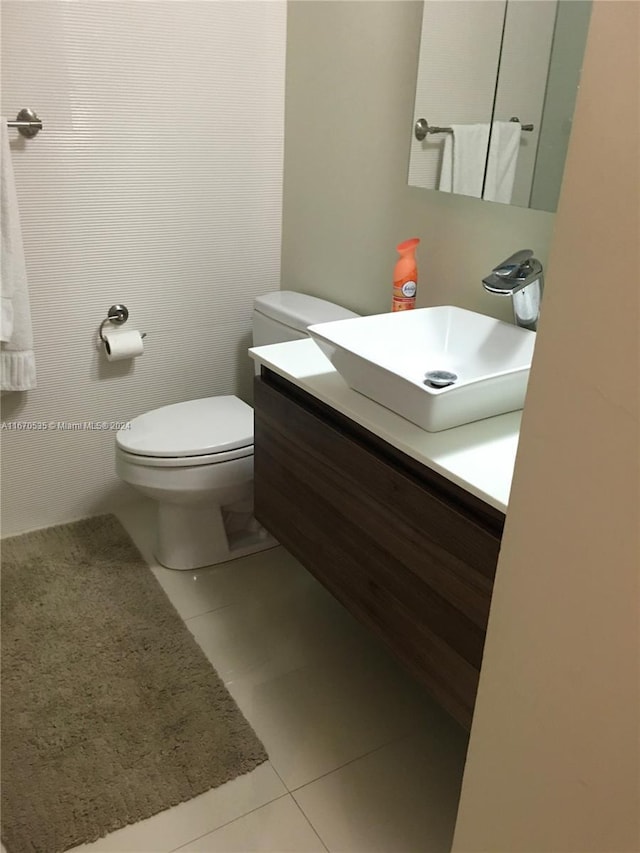 5161 Collins Ave Unit 801, Miami Beach, FL 33140 - half bath featuring tile patterned floors and vanity