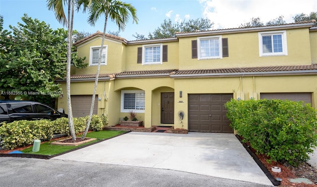 view of front of property with a garage