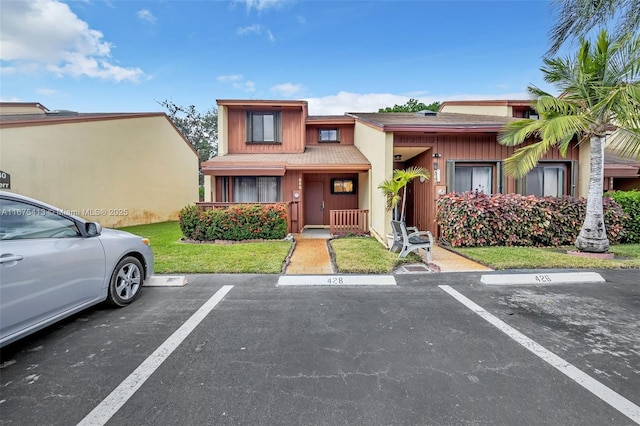 428 SE 11th Ter, Dania Beach, FL 33004 - townhome / multi-family property featuring uncovered parking and a front yard