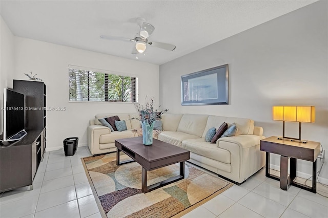 428 SE 11th Ter, Dania Beach, FL 33004 - living area with light tile patterned flooring, ceiling fan, and baseboards