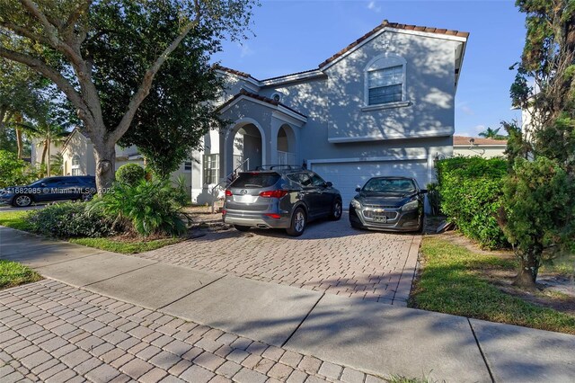 view of front of property featuring a garage