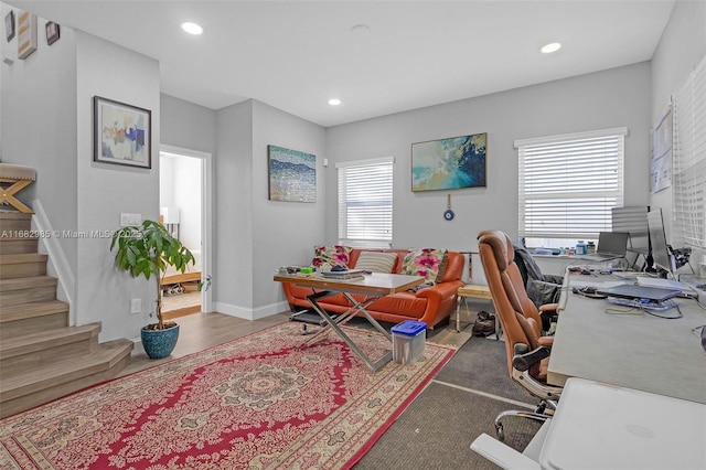 home office with hardwood / wood-style floors