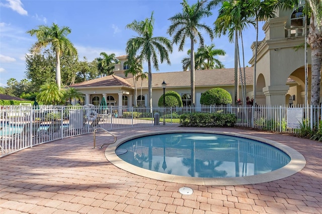 view of swimming pool featuring a patio