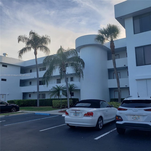 view of outdoor building at dusk