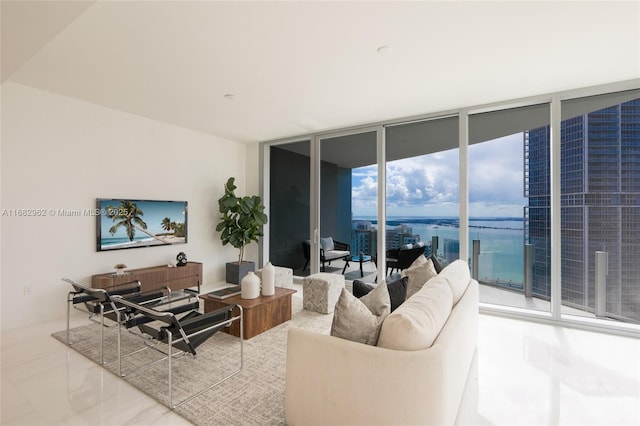 living room featuring a wall of windows