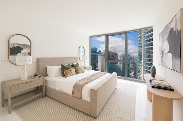 bedroom featuring floor to ceiling windows