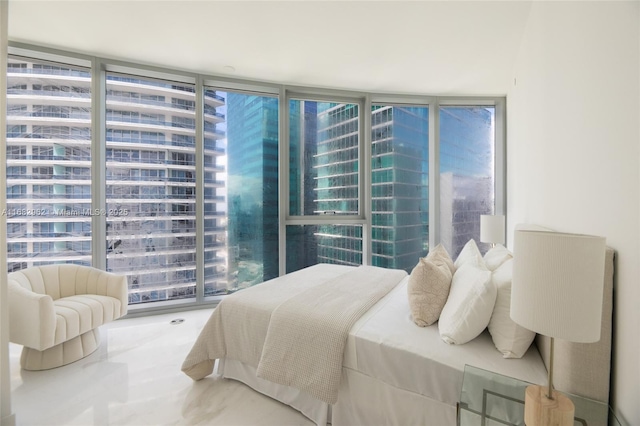 bedroom with a wall of windows