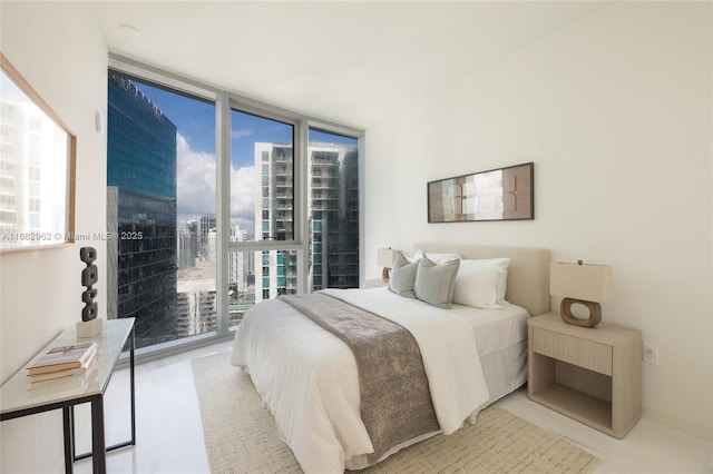 bedroom with a wall of windows