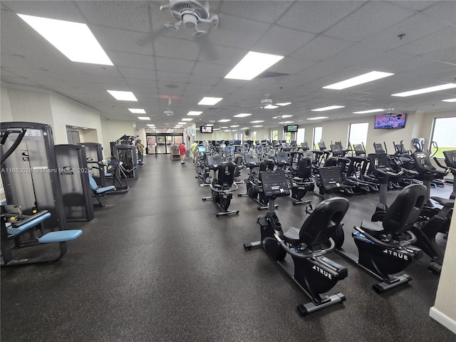 gym featuring a drop ceiling