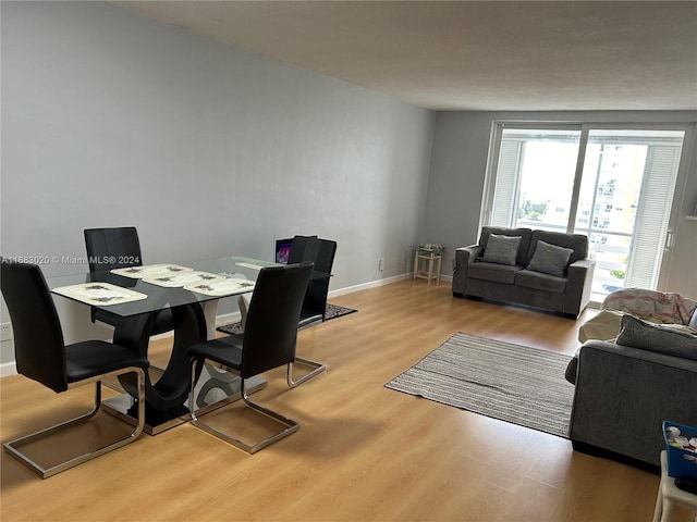 dining space featuring light hardwood / wood-style flooring