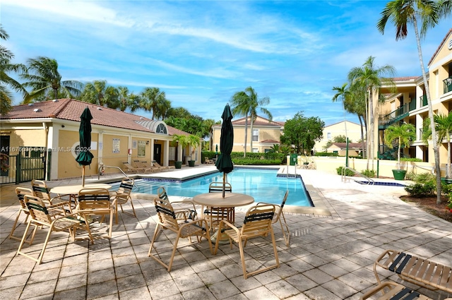 view of swimming pool featuring a patio area