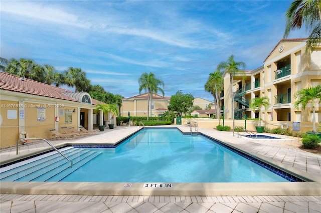 pool with a patio