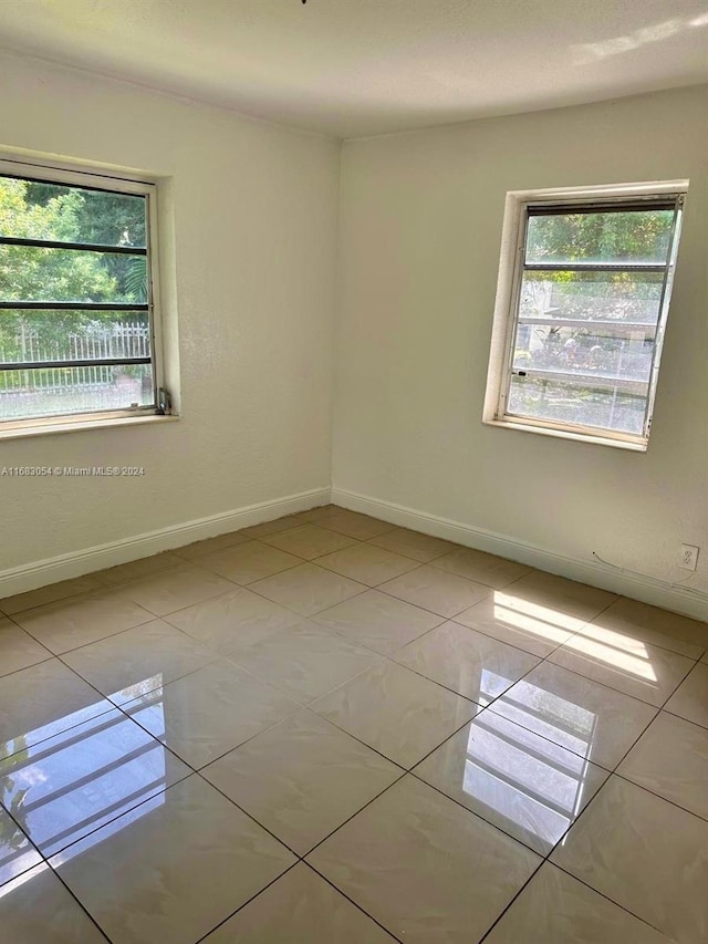 view of tiled empty room