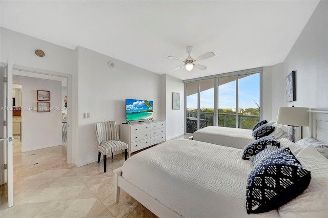 bedroom with ceiling fan and access to outside