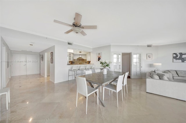 dining room with ceiling fan